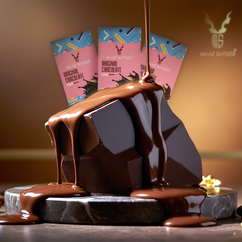 Chocolate being poured over a block of chocolate with two packages in the background.